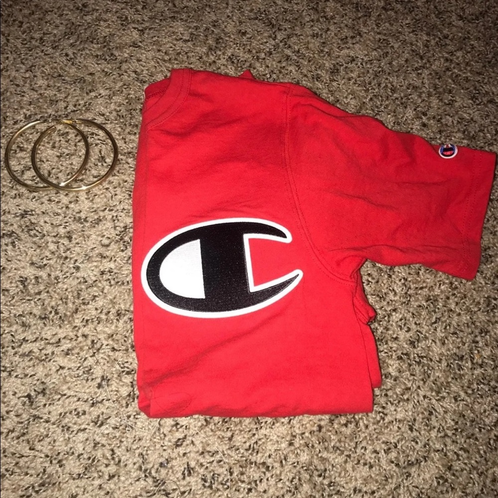 Red champion shirts gold earrings